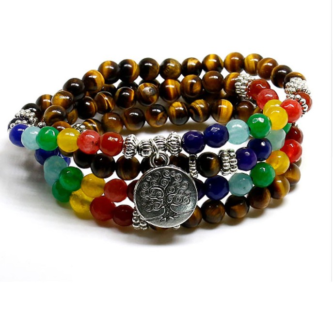 Chakra Tibetan Bodhi Prayer Beads Mala Wrap Bracelet. Chakra jewelry is believed to promote balanced energy, inner peace, emotional healing, and spiritual growth. A beautiful piece for the Divine Aura by Roop collection.