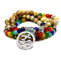 Chakra Tibetan Bodhi Prayer Beads Mala Wrap Bracelet. Chakra jewelry is believed to promote balanced energy, inner peace, emotional healing, and spiritual growth. A beautiful piece for the Divine Aura by Roop collection.