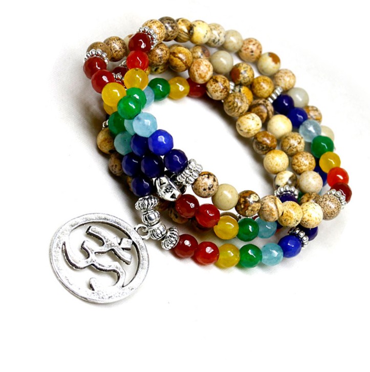 Chakra Tibetan Bodhi Prayer Beads Mala Wrap Bracelet. Chakra jewelry is believed to promote balanced energy, inner peace, emotional healing, and spiritual growth. A beautiful piece for the Divine Aura by Roop collection.