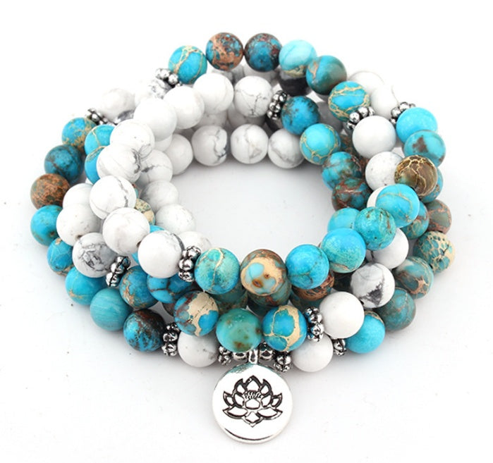 Howlite Calm Mala Bracelet (108 Beads). Designed to support balanced energy, inner peace, emotional healing, and spiritual growth, this jewelry helps keep your mind, body, and spirit aligned. Product from Divine Aura by Roop.