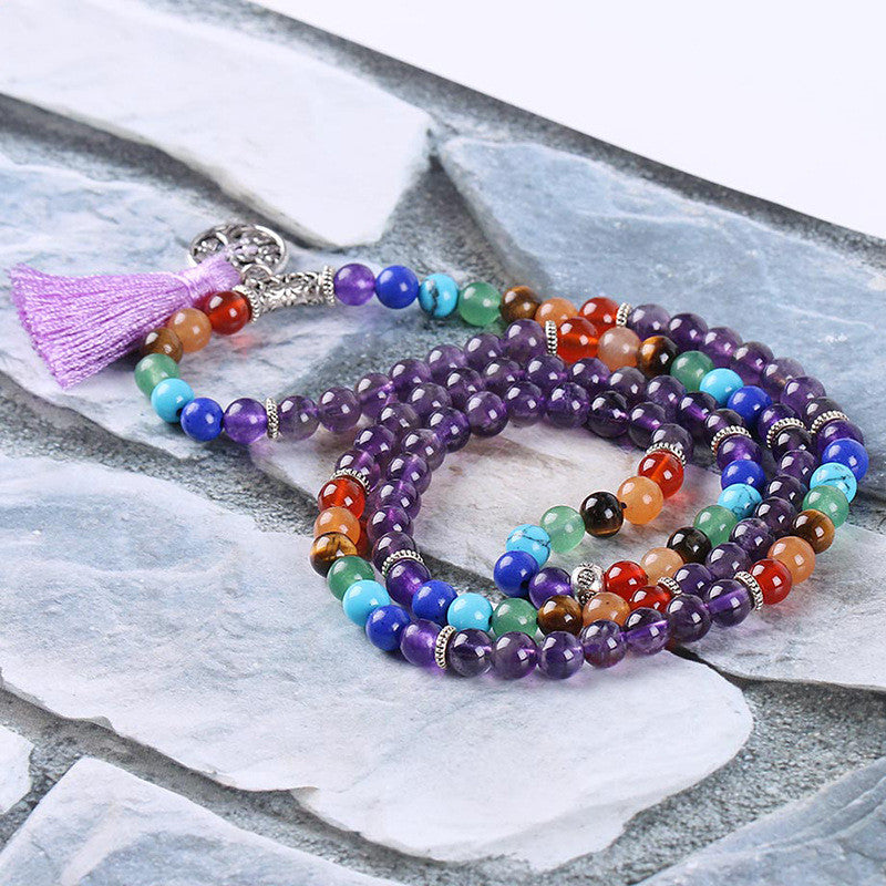 7 Chakra Healing Mala Necklace. Wearing chakra jewelry helps support energy flow, inner peace, emotional healing, and spiritual growth. Created with love and positive energy — Divine Aura by Roop.