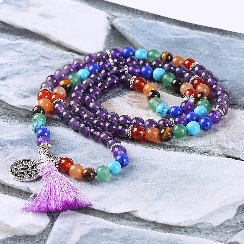 7 Chakra Healing Mala Necklace. Wearing chakra jewelry helps support energy flow, inner peace, emotional healing, and spiritual growth. Created with love and positive energy — Divine Aura by Roop.