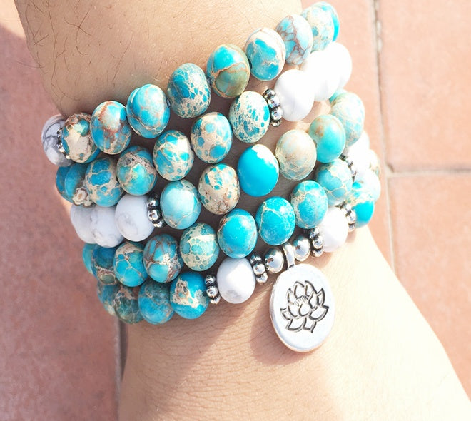 Howlite Calm Mala Bracelet (108 Beads). Designed to support balanced energy, inner peace, emotional healing, and spiritual growth, this jewelry helps keep your mind, body, and spirit aligned. Product from Divine Aura by Roop.