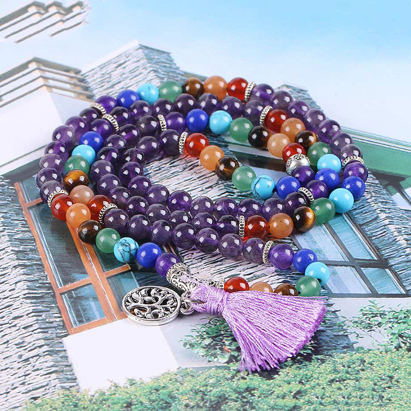 7 Chakra Healing Mala Necklace. Wearing chakra jewelry helps support energy flow, inner peace, emotional healing, and spiritual growth. Created with love and positive energy — Divine Aura by Roop.